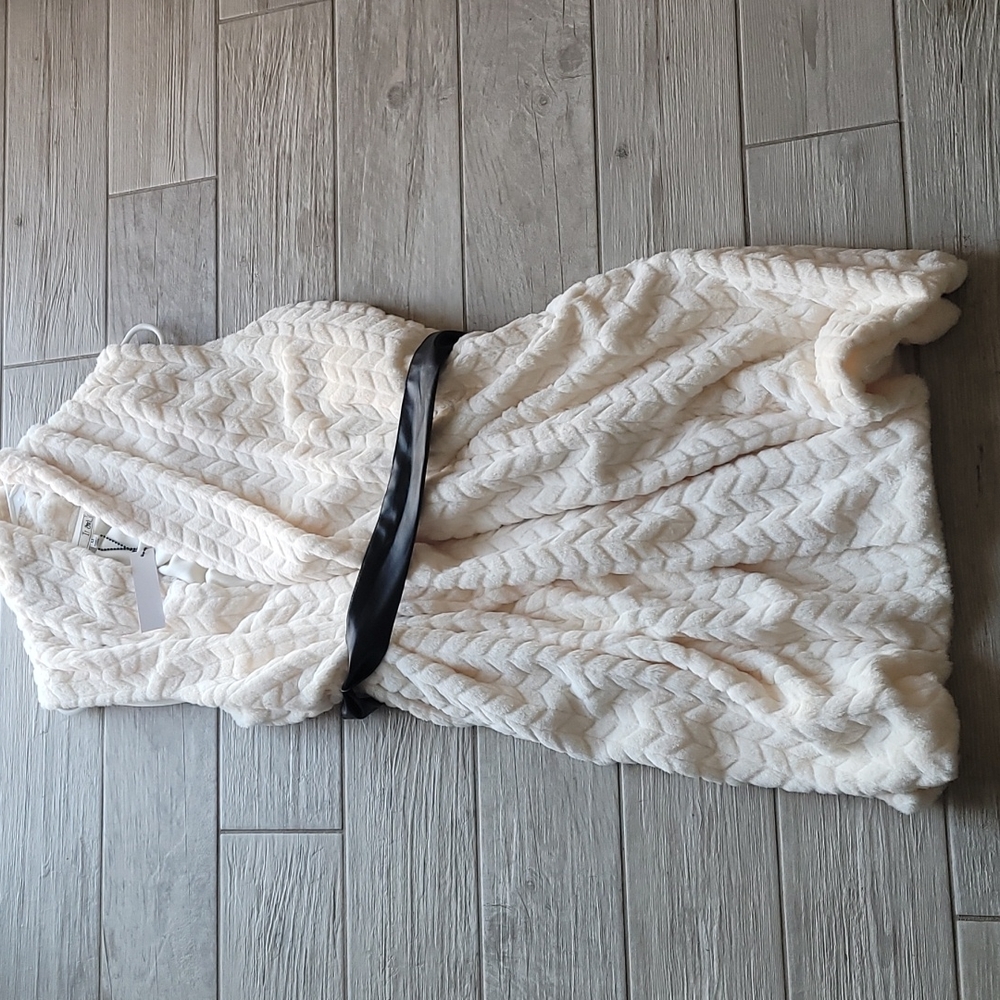 Sleeveless coat /vest